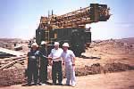 inspecting a Russian jumbo drill in Zambia